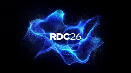 Logo RDC26 entouré de particules bleues, visuel officiel Roblox Developers Conference 2026
