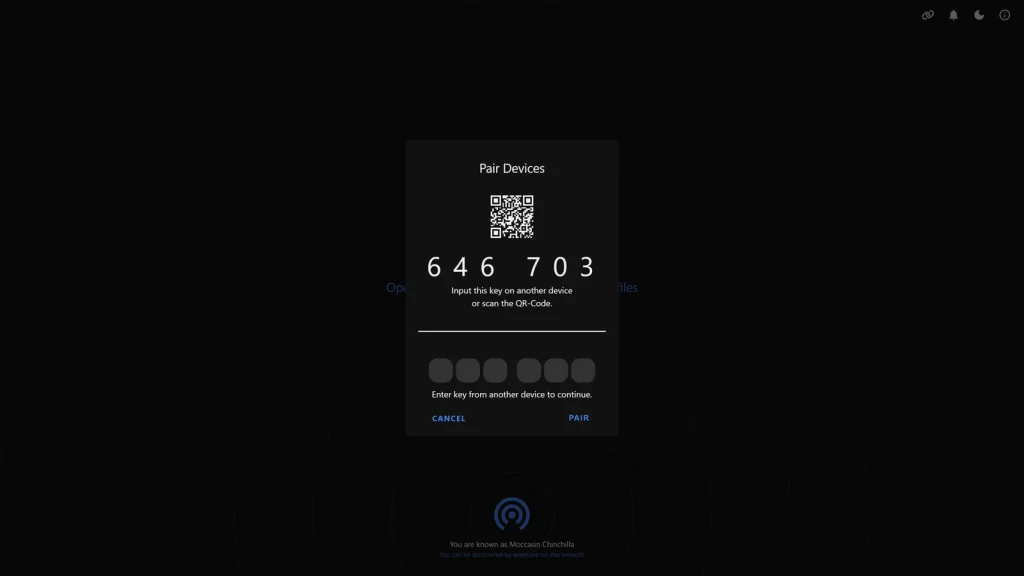 Fenêtre d’appairage de PairDrop affichant un code à six chiffres et un QR code à saisir sur un autre appareil